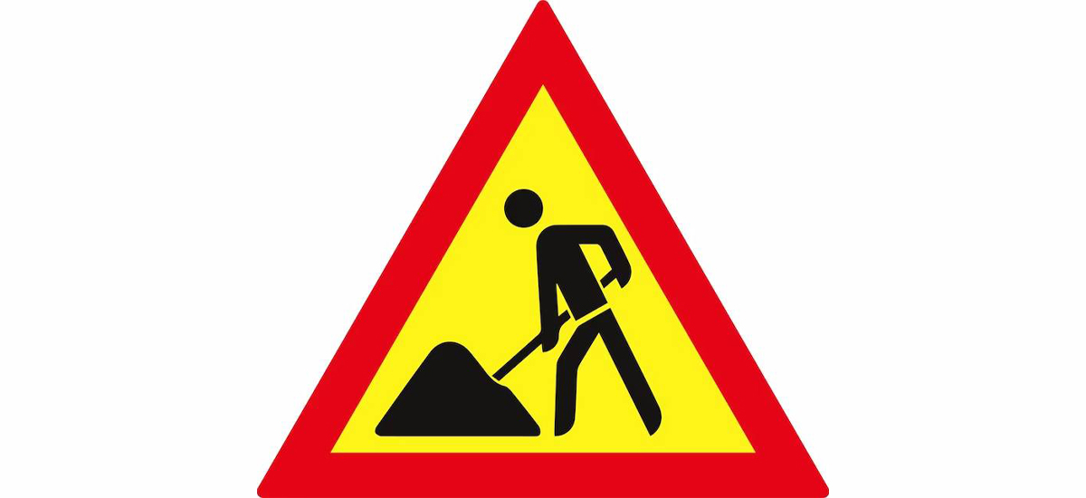 Road blacktopped long after opening of track