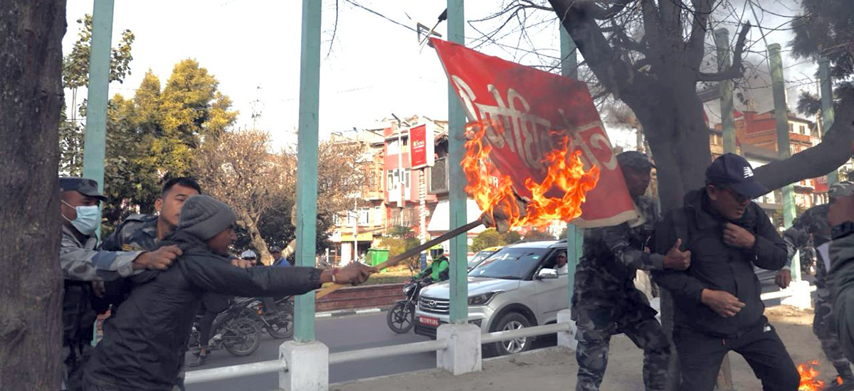 Demonstrators attempt to burn banner of prohibition in Maitighar (Photos)