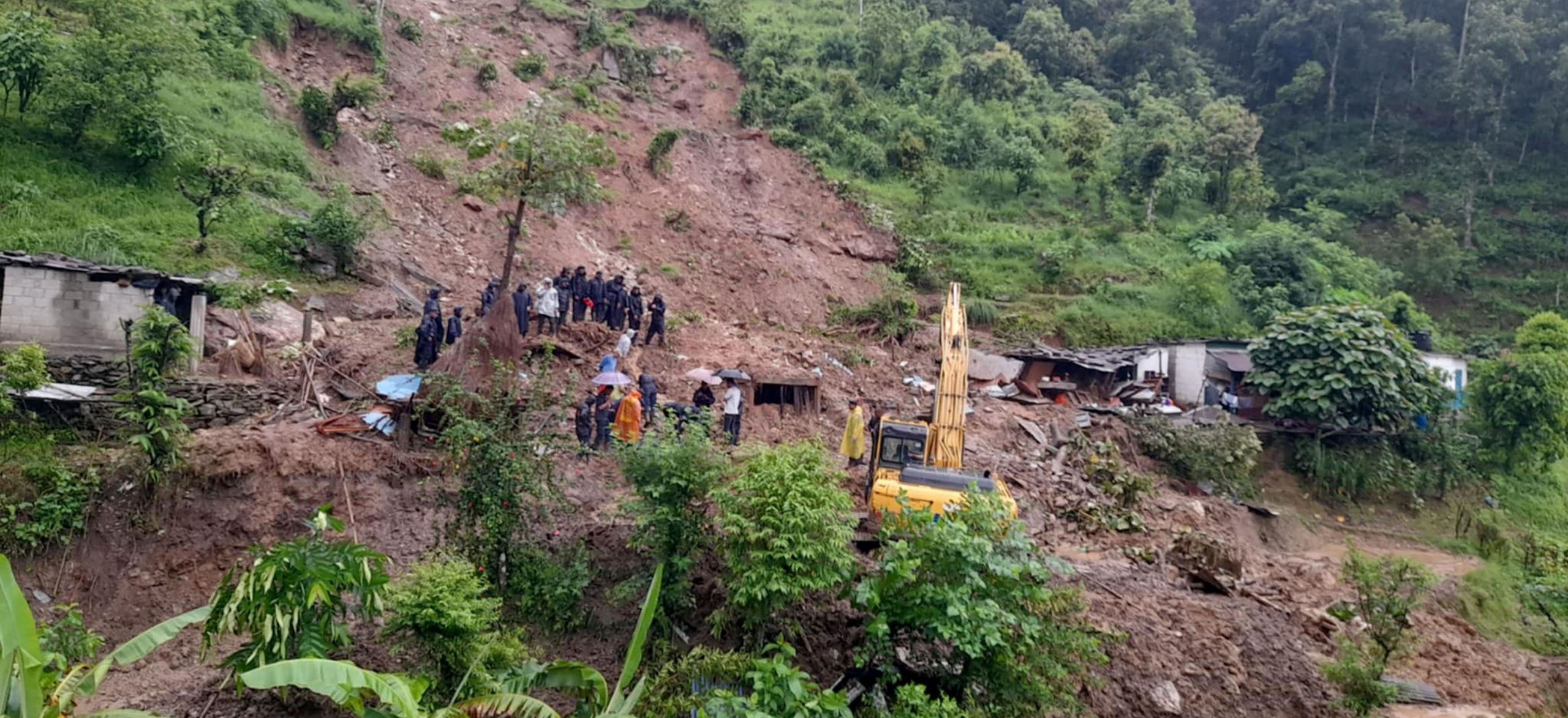 Body of woman buried in landslide found