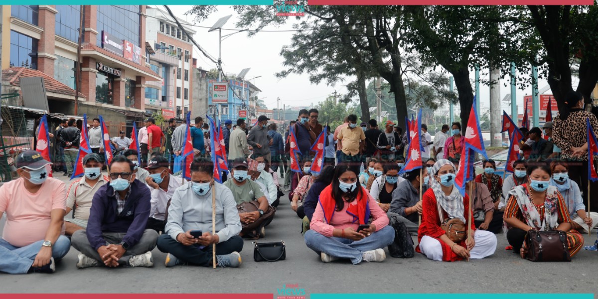 Prasai’s supporters demonstrate with black tape over their mouths at Maitighar(Photo Feature)