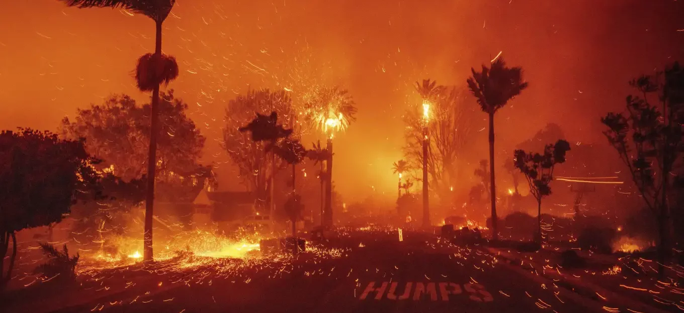 Firefighters race to beat LA blazes as winds grow and death toll hits 16